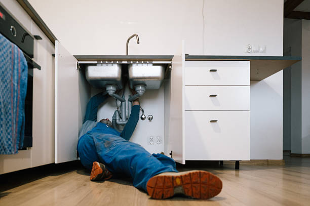 Professional Plumbing technician working in Wesson, MS